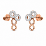 A pair of rose gold stud earrings featuring a cluster of three circular elements, with the top two encrusted with clear pavé diamonds and the bottom three open circular rings, shown on a plain white background.
