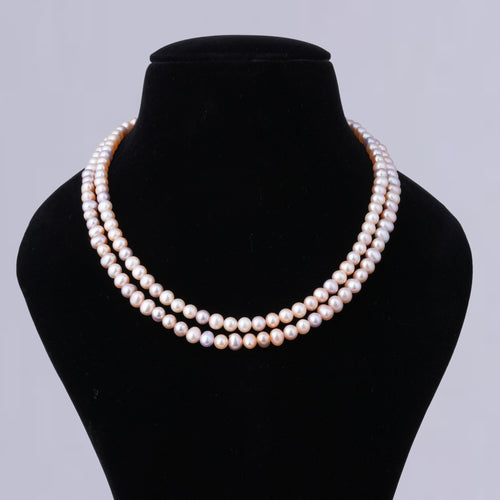 Lustrous Peach Pearl Necklace